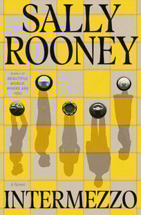 A yellow and tan chessboard with five pieces with their shadows coming down are on the cover. 